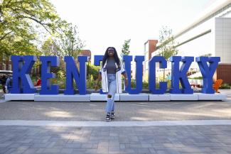 Student with Kentucky sign