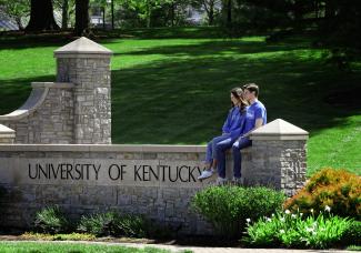 Students on UK stone sign